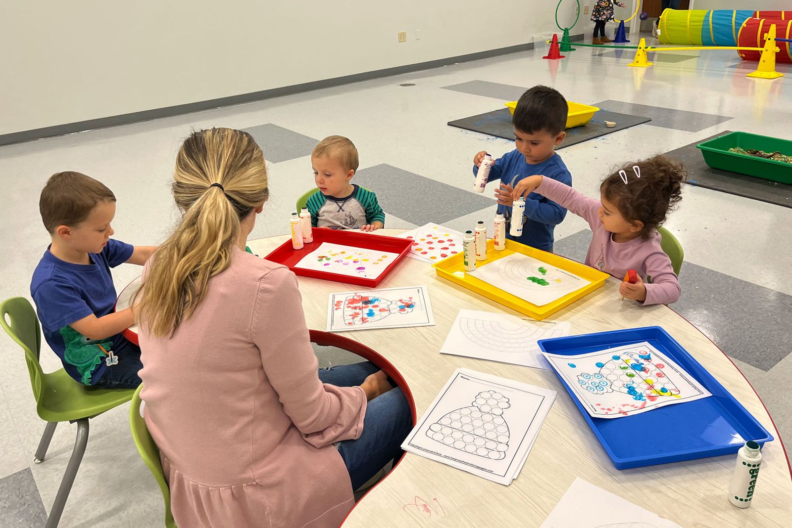 Teacher working with students