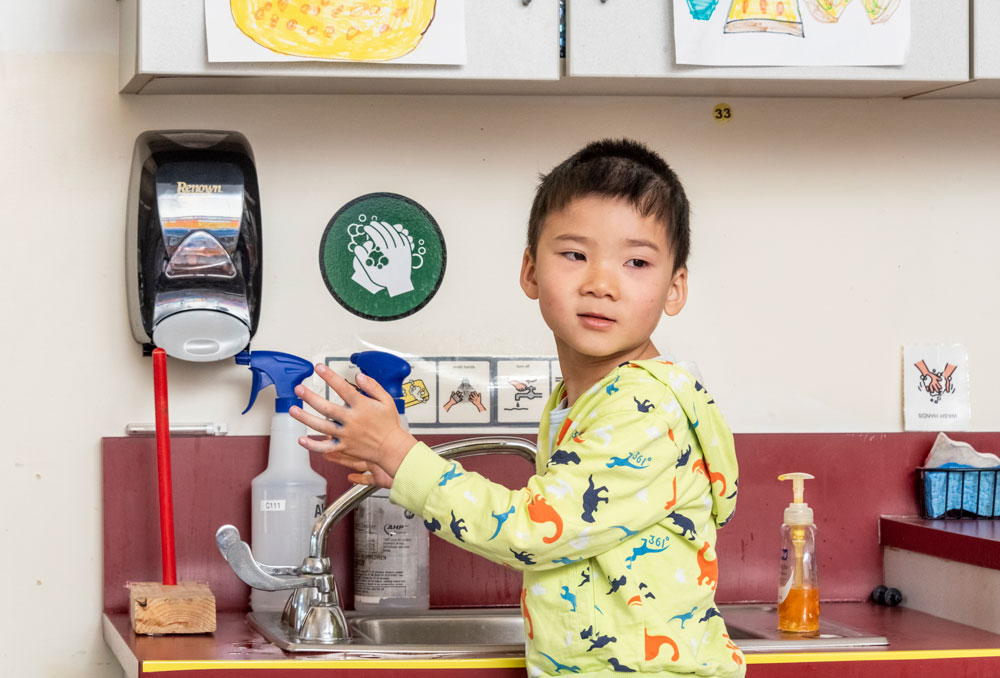 PreSchool boy washing hands - Spring 2023