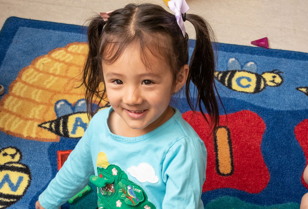 PreSchool girl on rug - Spring 2023