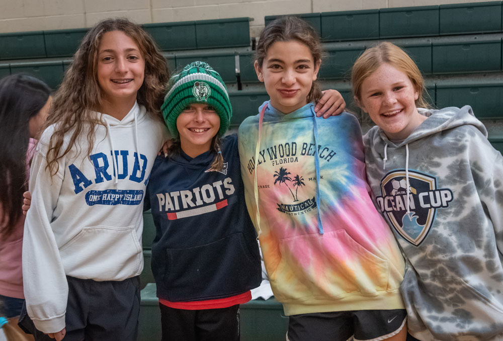 Four girls posing  in gym - Fall 2022